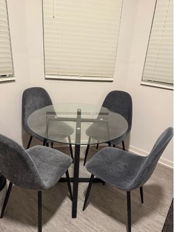 5-piece dining table set with upholstered chairs