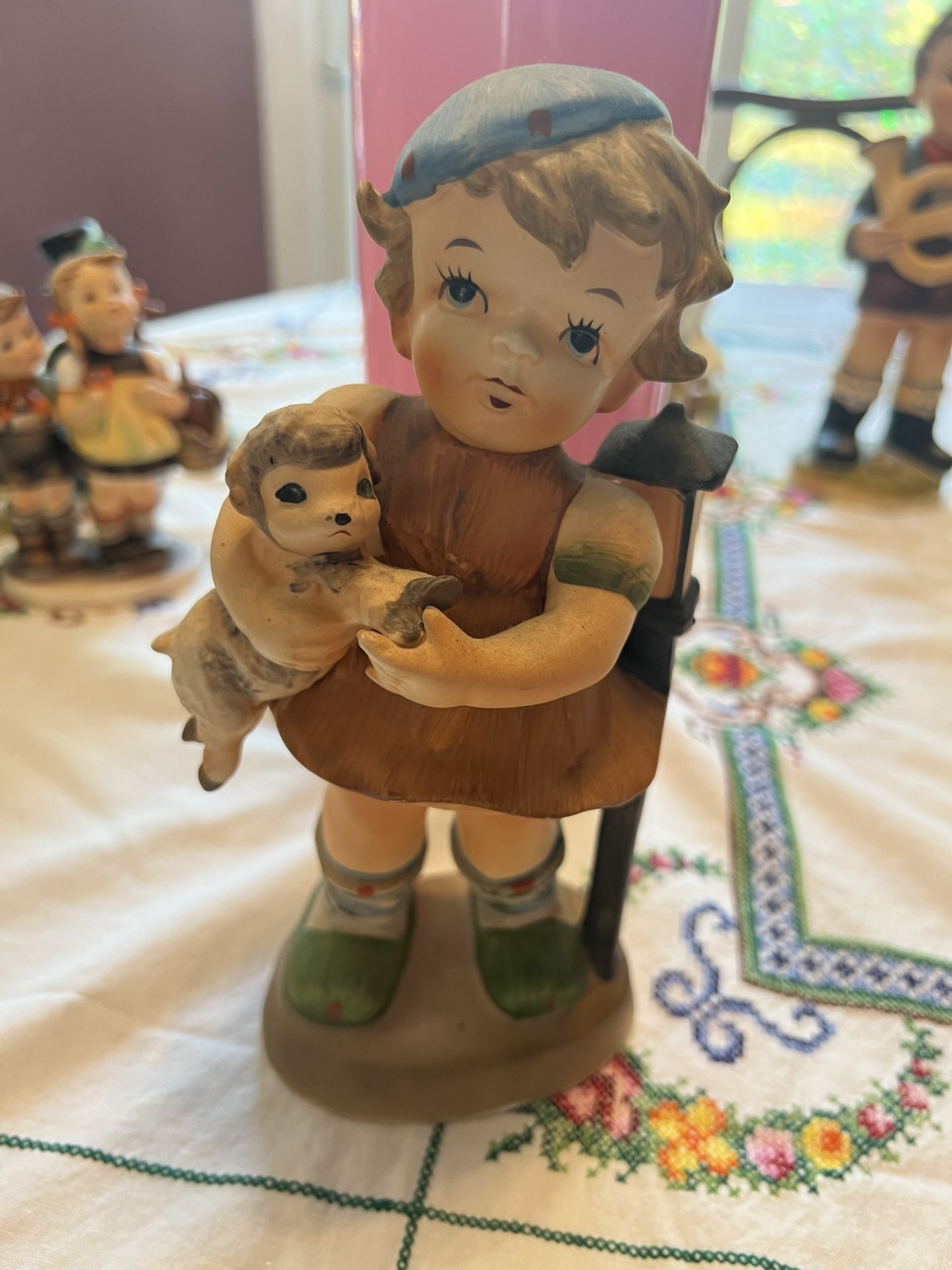 Girl Holding A Lamb
