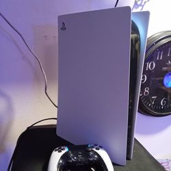 PlayStation 5 with controller