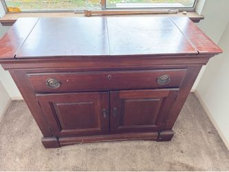 Bassett Chris Madden Collection Bar Flip Top Dry bar vanity with wood inlay.