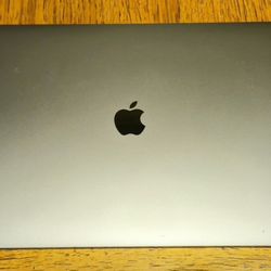 2019 MacBook Pro With Touchbar, 16 inches.