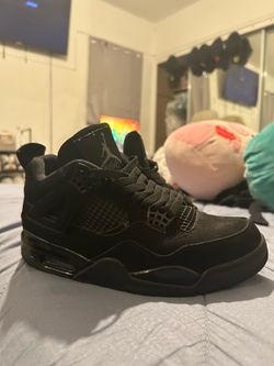 Jordan 4s black cats