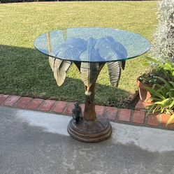 Palm tree glass top table