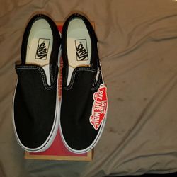 Vans Black Slip Ons