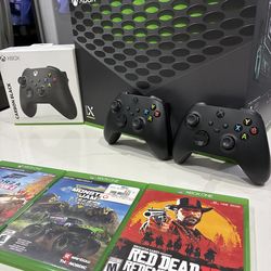 Xbox series x bundle- two controllers- three games
