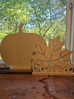 Wood pumpkin and leaf ready for painting