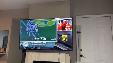 65 inch Samsung smart tv with mounting brackets