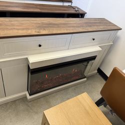 New, 63” TV stand With Fireplace ( Already Assembled 