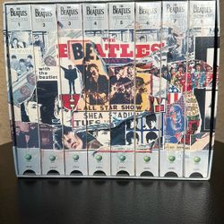 The Beatles Anthology on eight VHS tapes