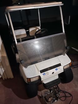 White Golf Cart with Roof and Windshield
