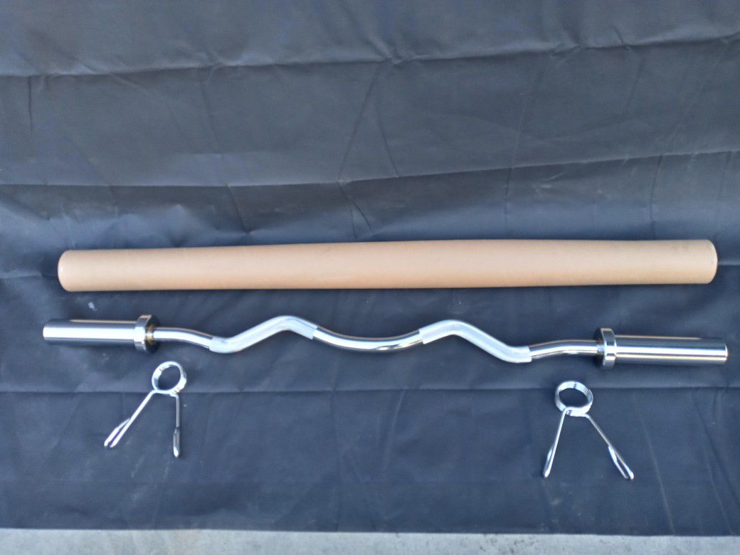4FT CURLED BARBELL.  BRAND NEW 