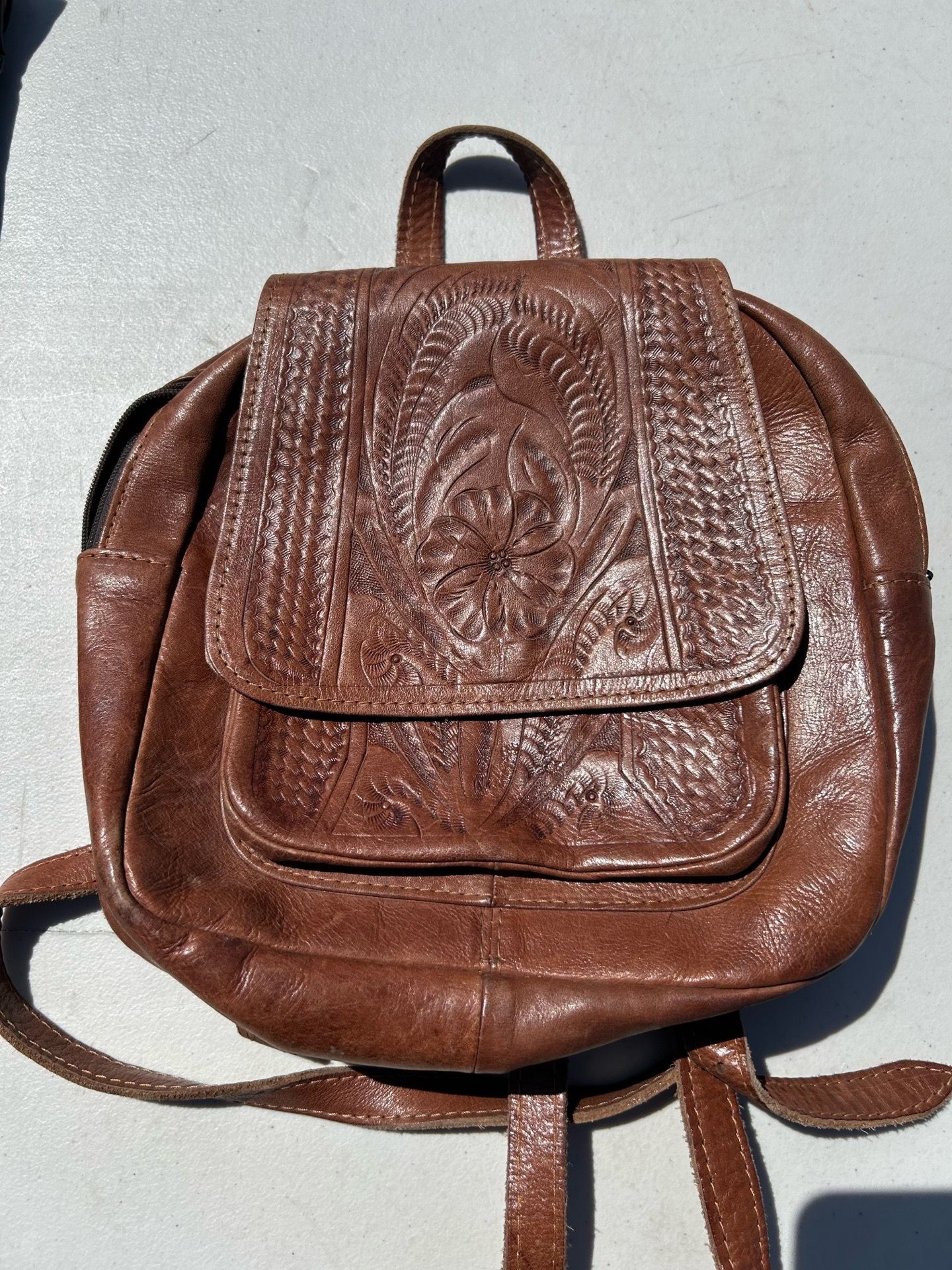Vintage leather floral backpack