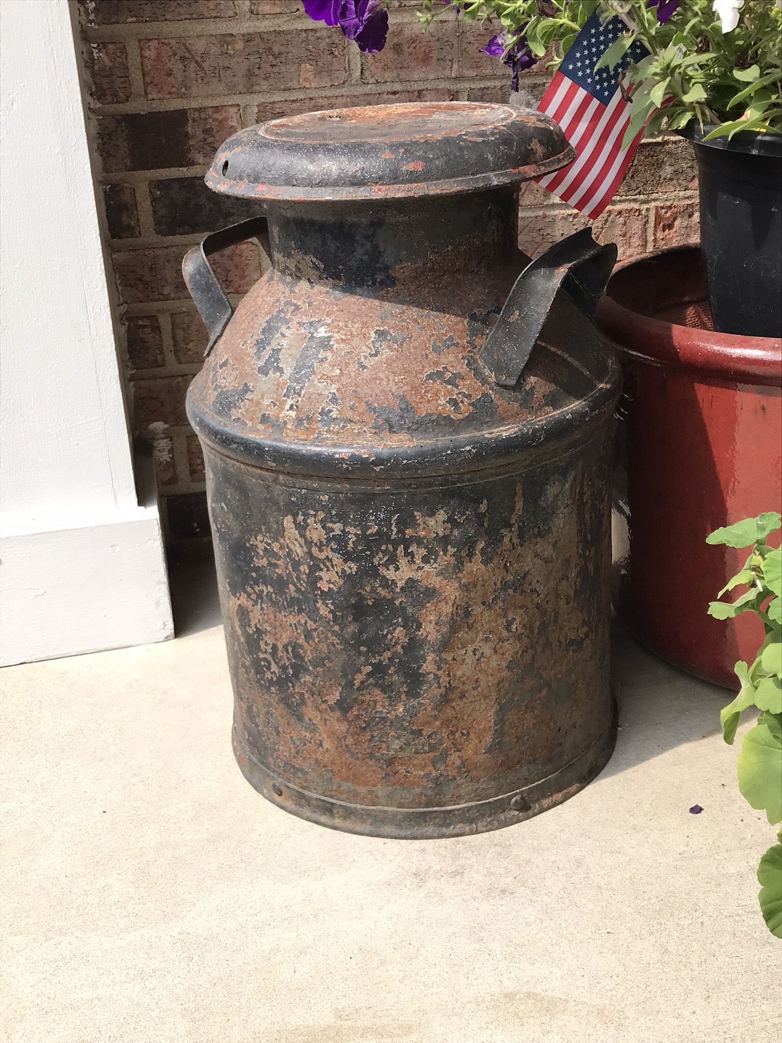 Antique farmhouse milk can with lid