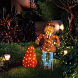 Scarecrow and pumpkin