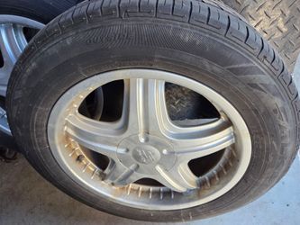Rims and tires off of Chrysler 300C