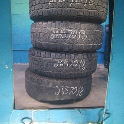 TIRE 265 70 18 AT  EACH ELMOFLES 