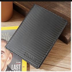 Luxury RFID Blocking Leather Passport Holder Travel Wallet For Men and Women (Carbon Black)