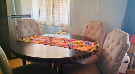 5 piece Oval dining table and chairs.