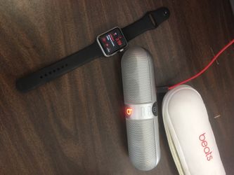 42mm Apple Watch. Wireless beats pill.
