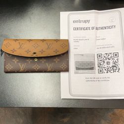 Louis Vuitton Emilie Monogram Reverse Wallet. 