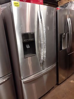 New scratch and dent Whirlpool french doors fridge with 6 months warranty