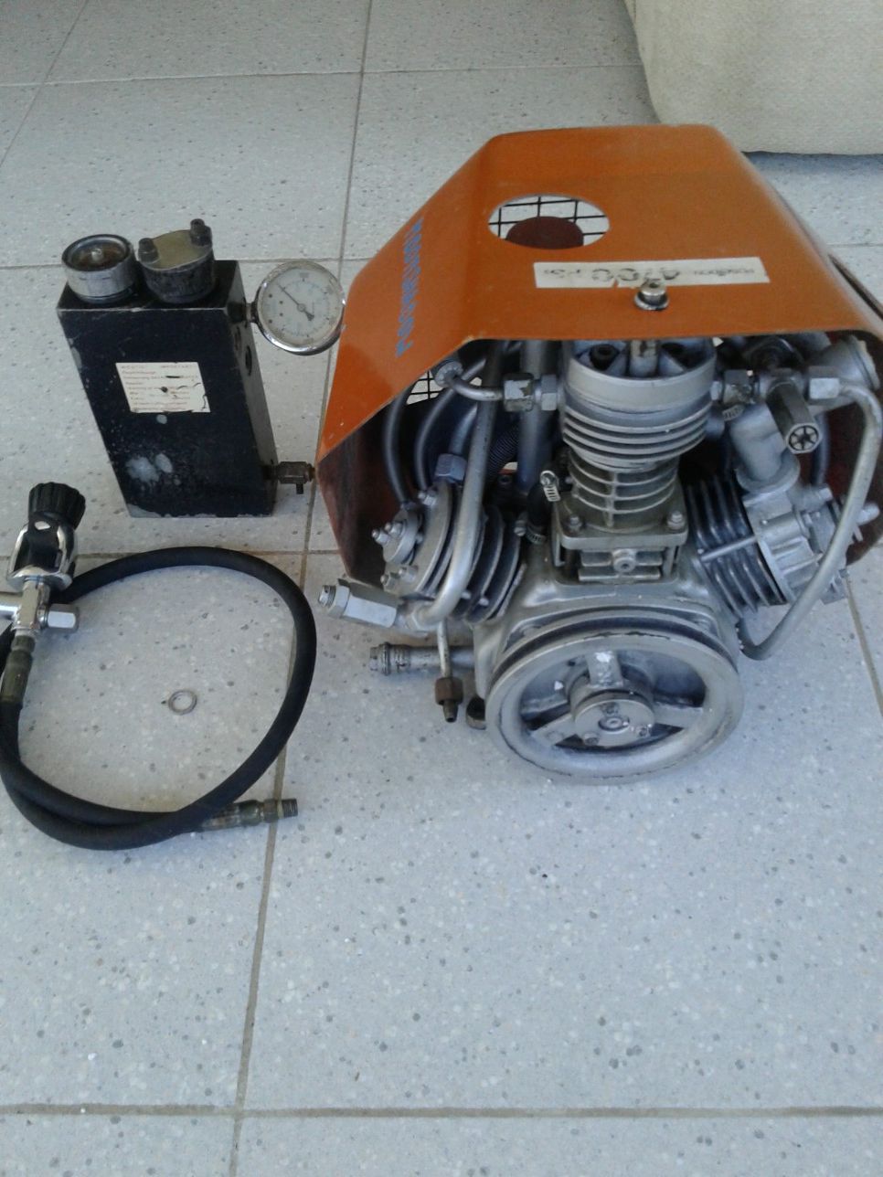Poseidon P91 or Bauer Purus Scuba Compressor