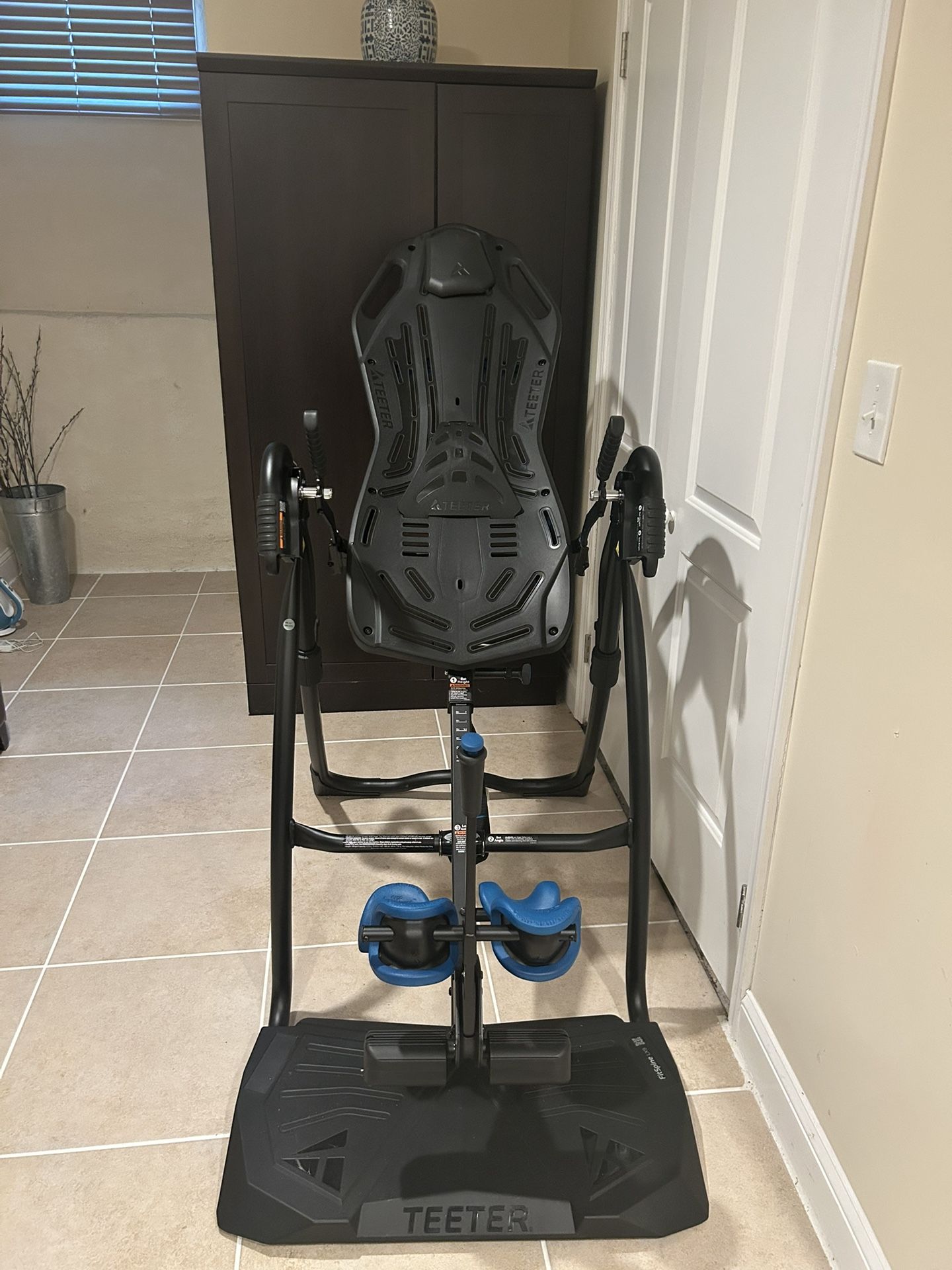 Strong Teeter Inversion Table ; Folds Neatly Upright.  