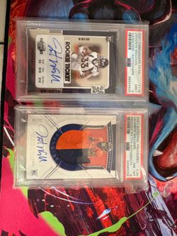 2 graded rookie cards with auto Javonte Williams