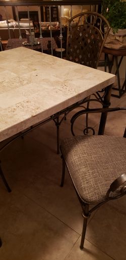 marble top table with 4 chairs