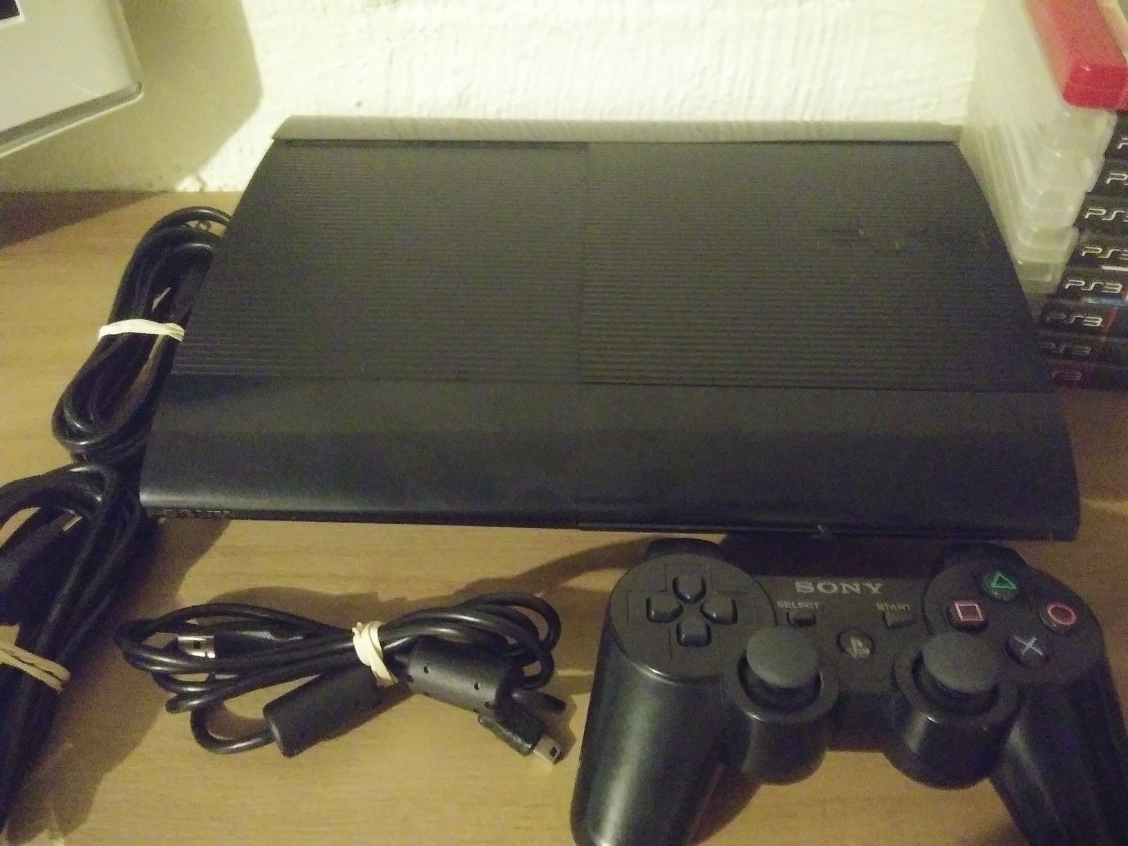 Ps3 slim with all cords and 9 games.