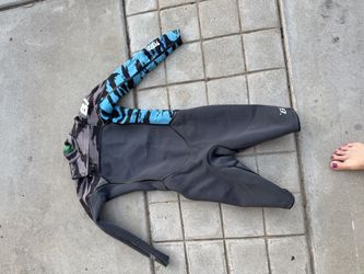 Lots of suits for young men or size small human