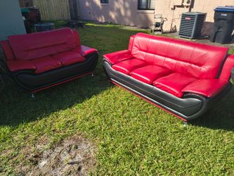 Red couches  good condition 200 cash takes them