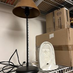 Two lamps A Mod desk Lamp And A Jesus Is Watching Illusion