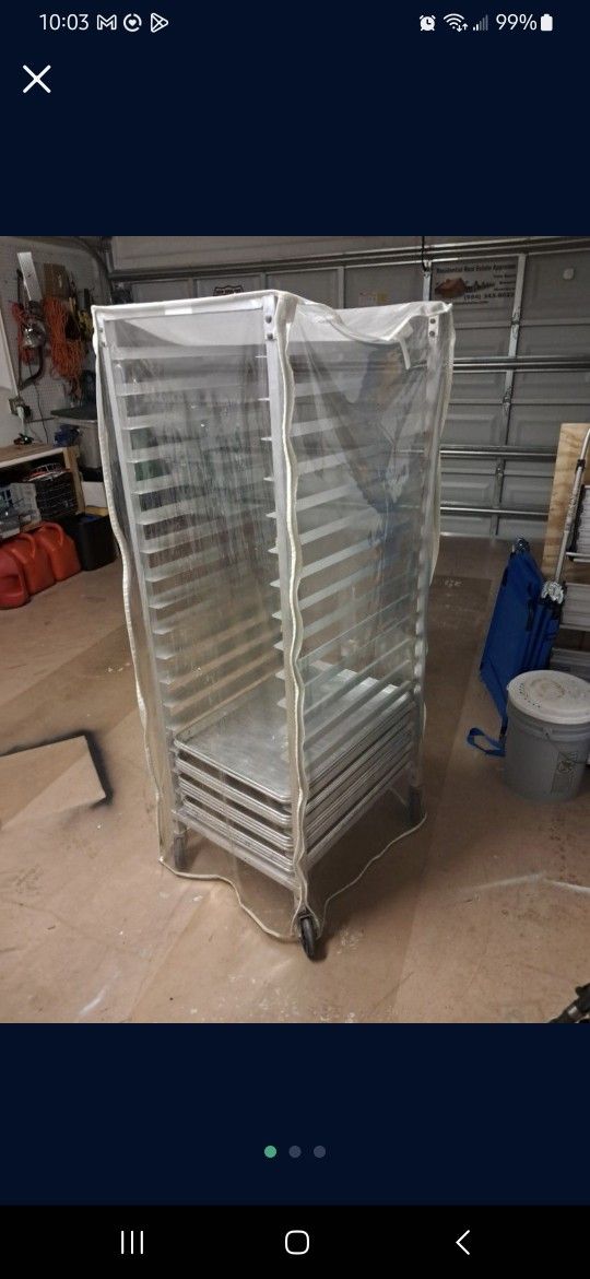 Baker's speed rack with cover and 12 sheet pans