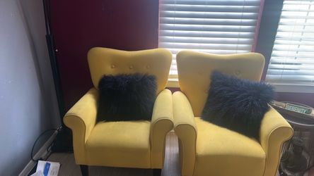 2 yellow chairs $50 with pillows