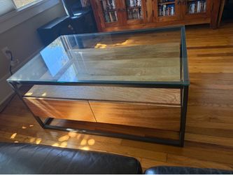 Hardwood, industrial style, glass top coffee table from West Elm