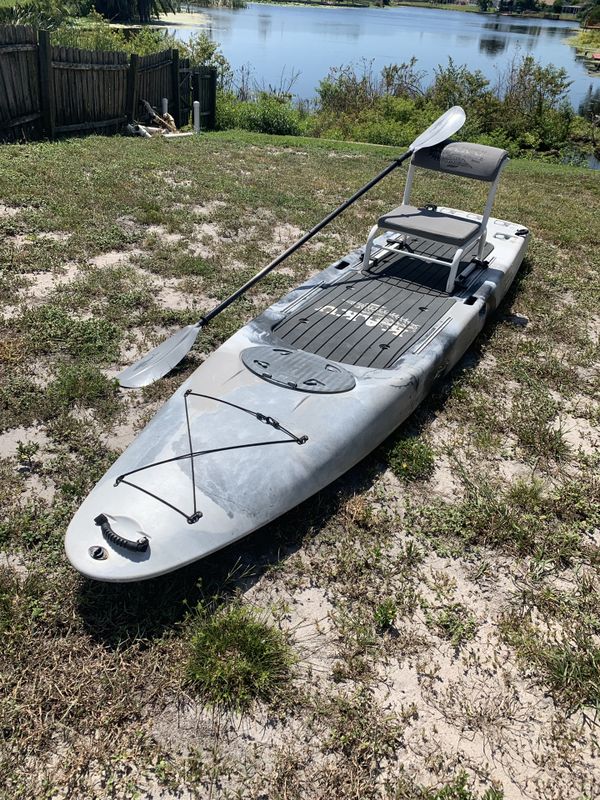 Kaku Voodoo Paddleboard with chair and paddle for Sale in Tarpon Springs, FL - OfferUp