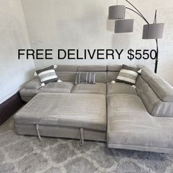 FREE DELIVERY - Grey Sleeper Sofa W/ Adjustable Headrest