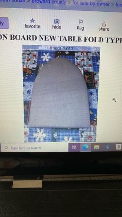 Brand New foldable ironing board with new cover