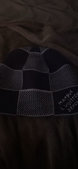 Louis Vuitton Damier Heritage Beanie featuring a tonal checkerboard pattern and an embroidered "Marque L. Vuitton Déposée" signature.
