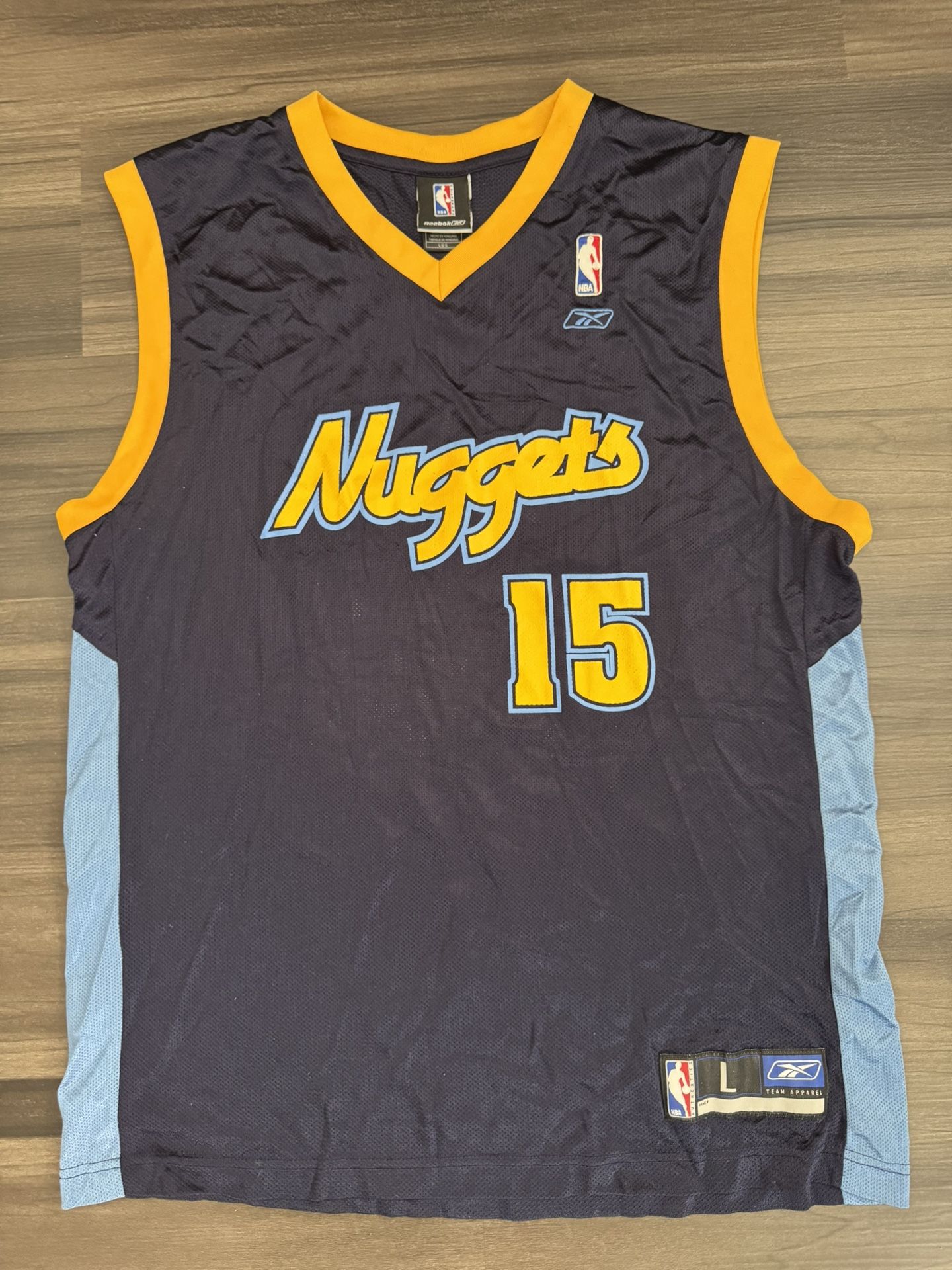 Reebok Denver Nuggets Carmelo Anthony #15 NBA Alternate Jersey Men’s Large 100% authentic. Good condition. This jersey is a 2000’s Reebok Denver Nu