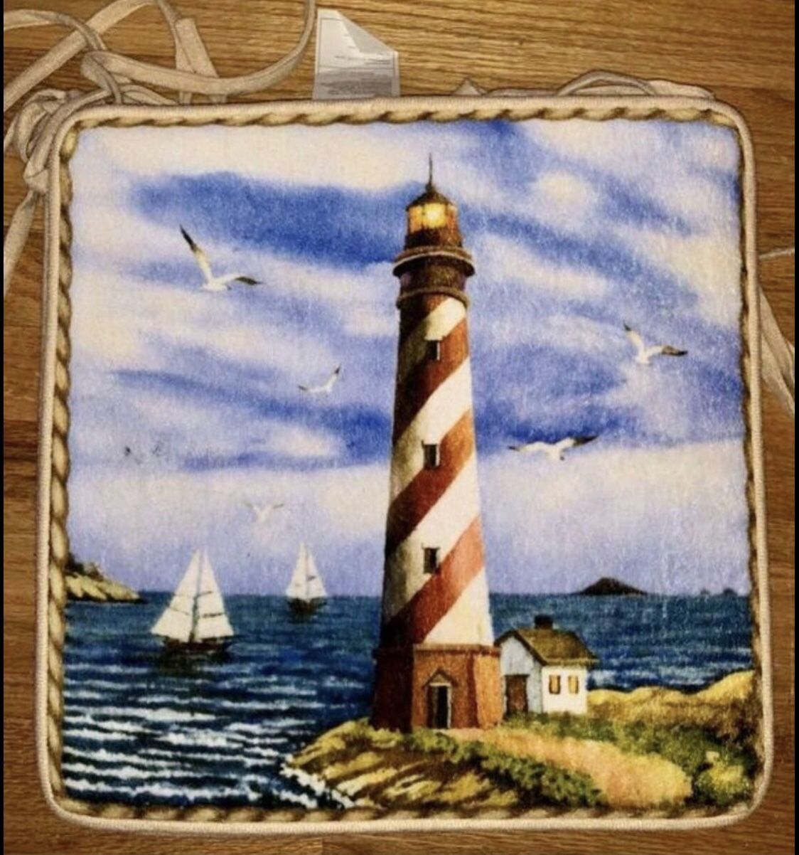 From Collections Etc 4 Chair Pads Light House Print