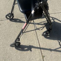 McKesson Rollator Walker – 4-Wheel, Foldable – Padded Seat & Loop-Lock Brakes – Steel, Black, 300 lbs