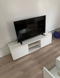 White TV Stand with Open Shelves and Doors