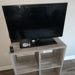 LG 32” TV With 4-Cub TV Stand -Firestick Included 