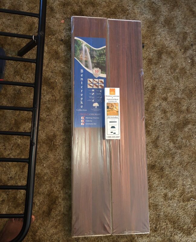 2 packs of laminate wood flooring