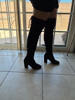 Chunky black knee high boots