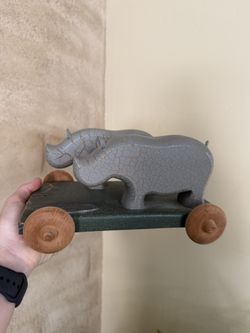 Henn Workshops Handcrafted Wooden Rhino Pull Toy from the Noah's Ark series, produced in 2001.