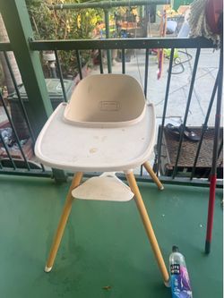 Lalo grapefruit color (pink) high chair
