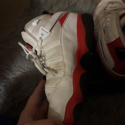 white, black, and red Air Jordan 6 Rings sneakers